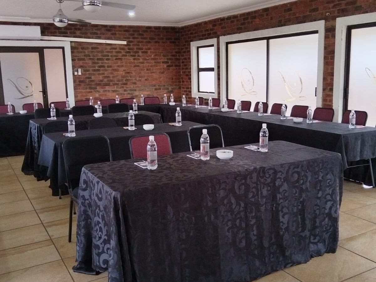 Conference room at Lotlametswe B&B set up boardroom-style