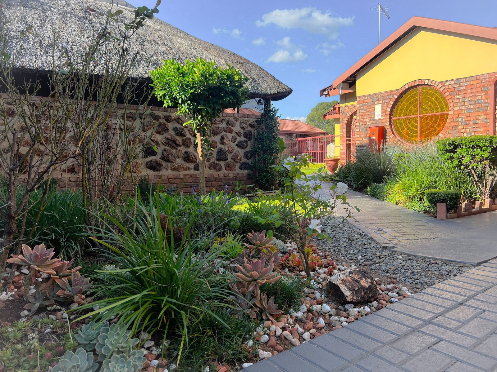 Landscaped garden pathway at Lotlametswe B&B