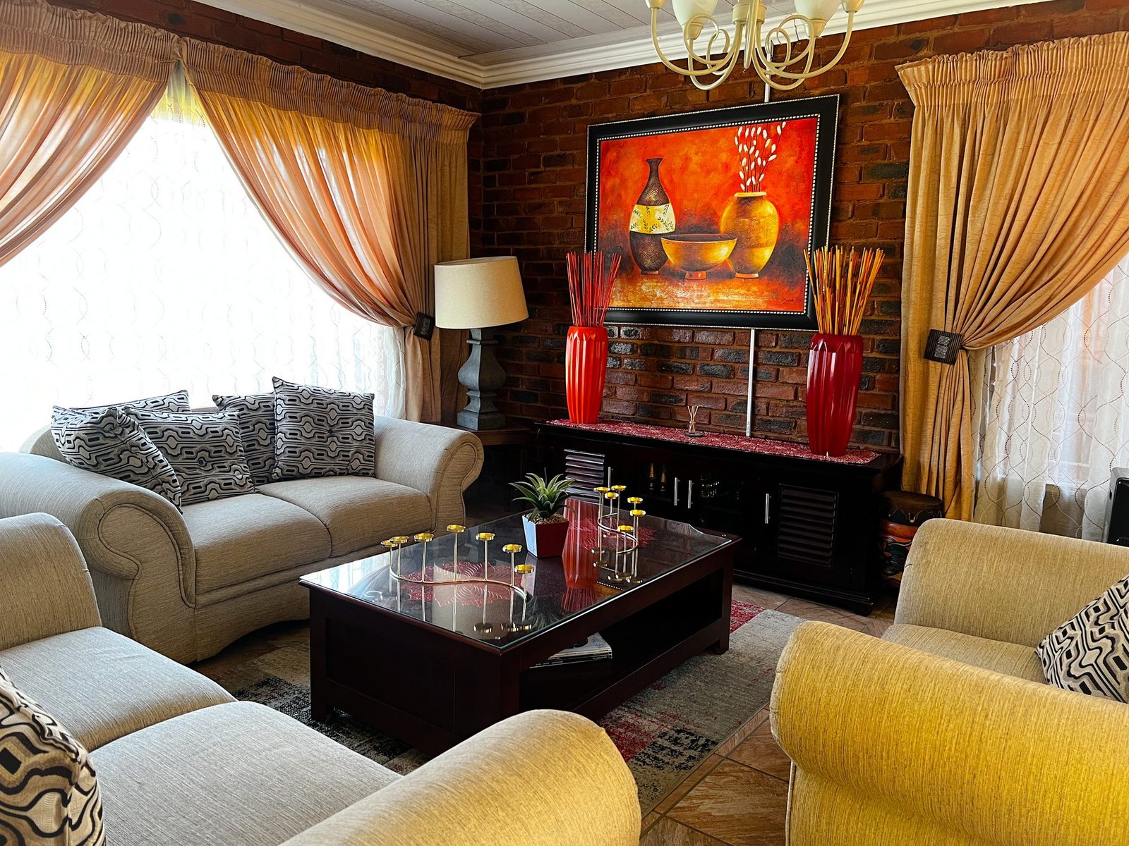 Warmly decorated guest lounge with comfortable seating